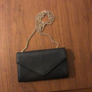 Black cross body wallet  by Barney’s New York